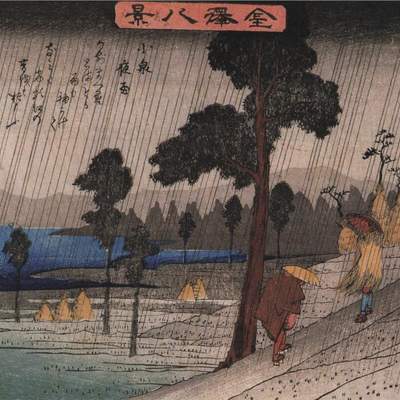 Dos hombres en una pendiente bajo la lluvia